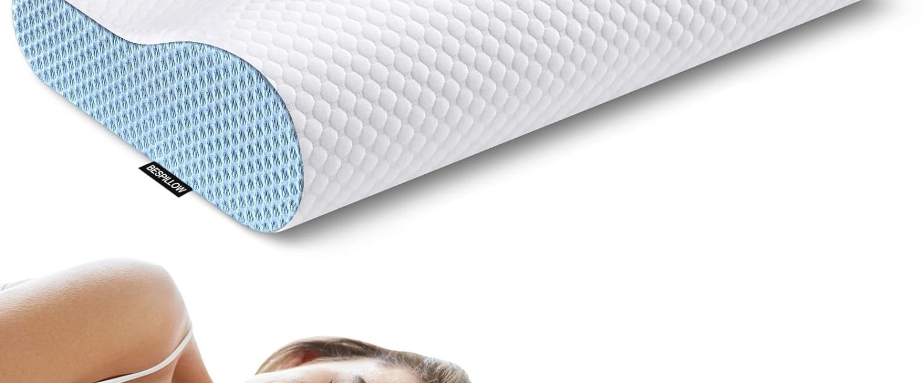 A sleeper resting on a Bespillow contour pillow
